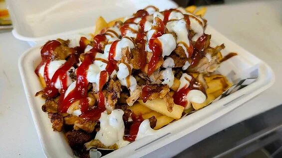 Chicken A.B. pack with sauces over chips